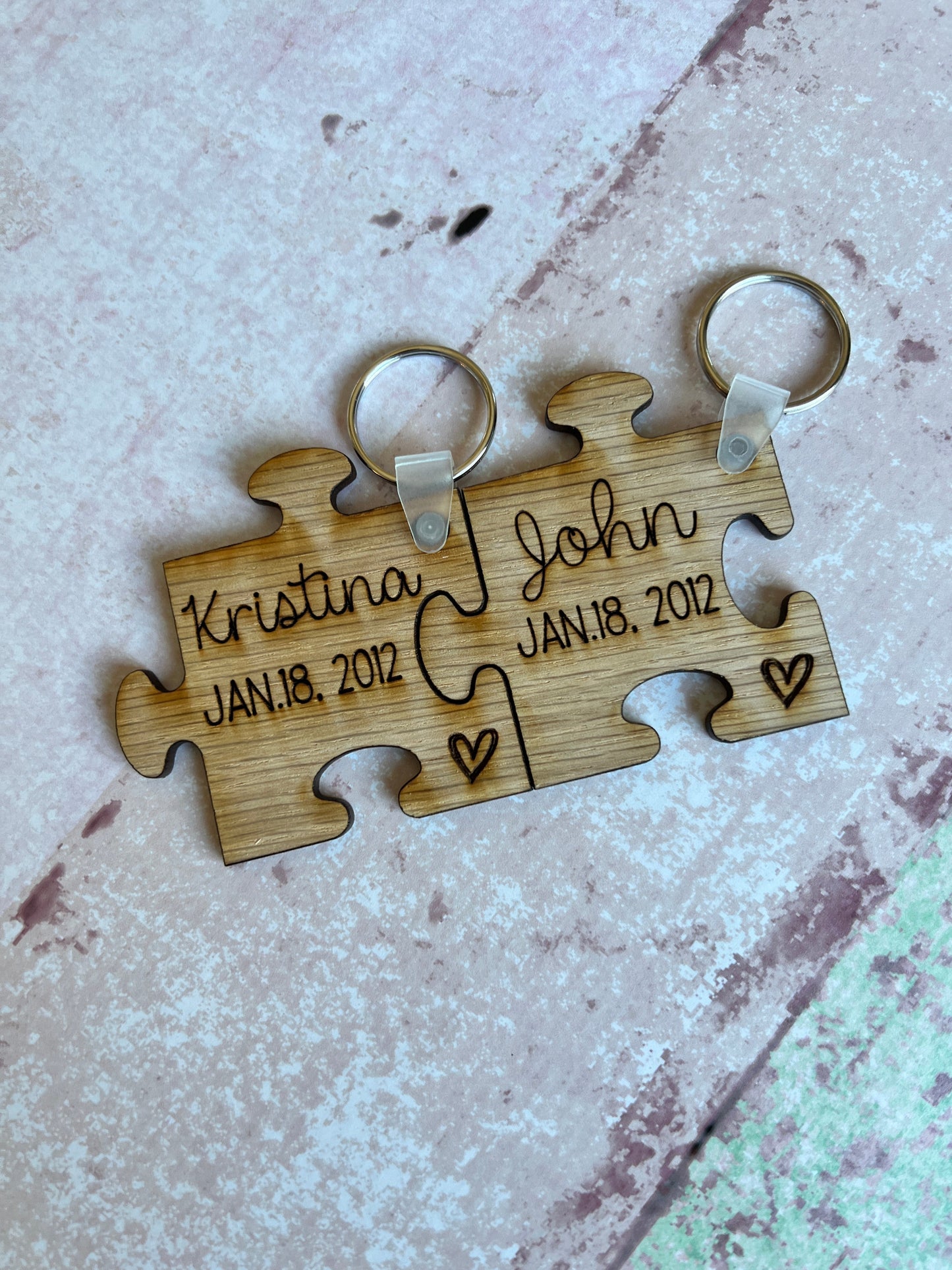 Matching puzzle piece keychains
